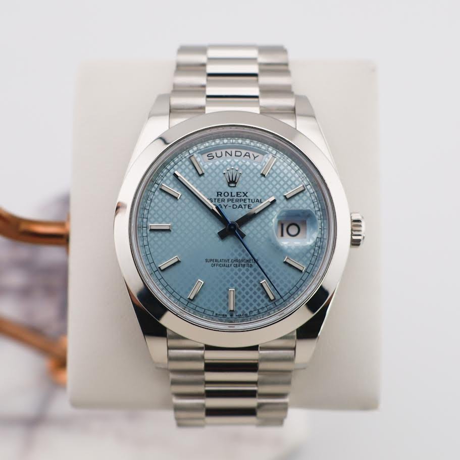 0_08203310-c338-4397-be57-d2a5f37d4490.jpg Rolex Day-Date 40 Platinum Ice Blue Diagonal Motif Dial & Smooth Bezel President Bracelet 228206 - - Image 1